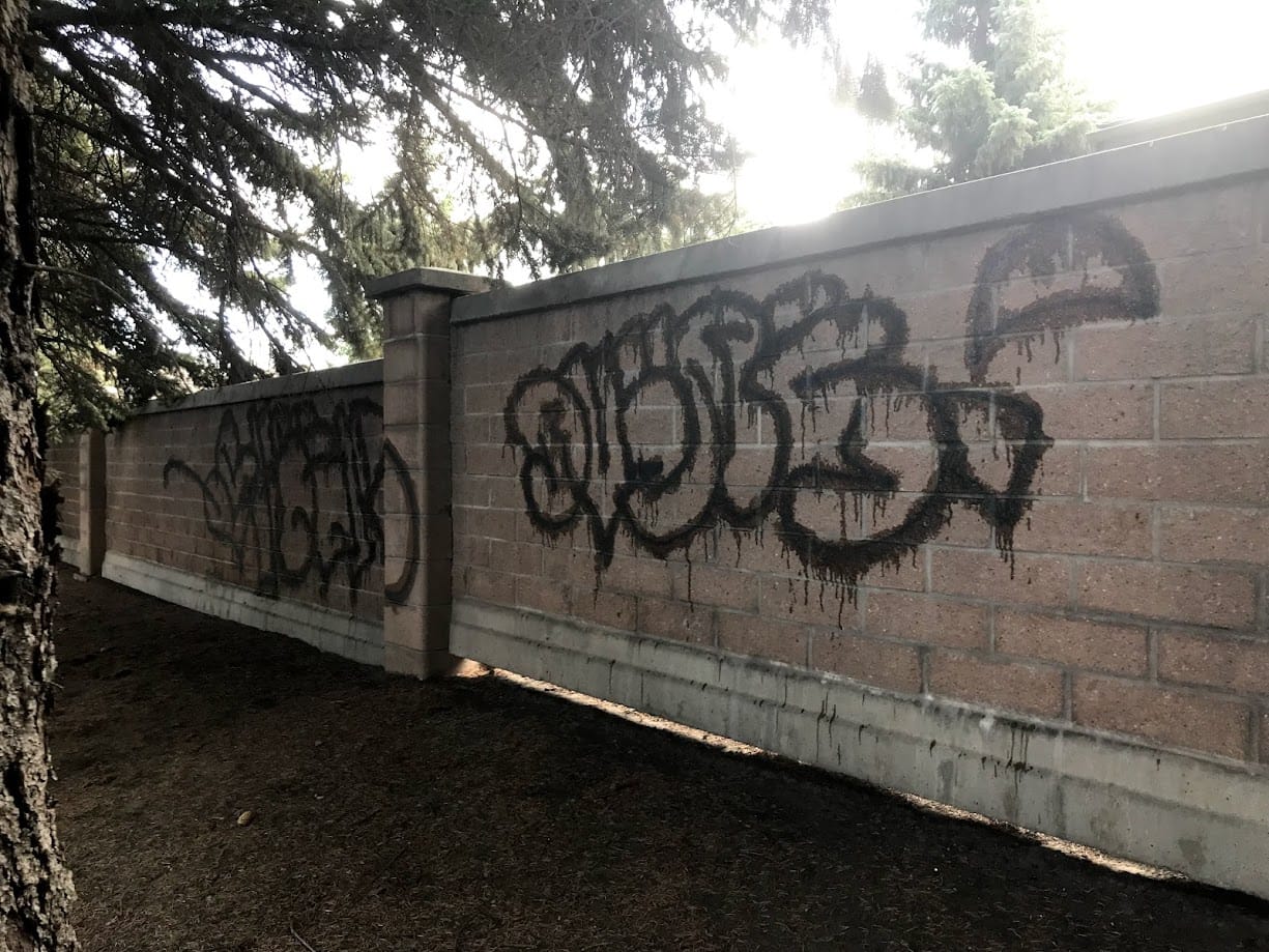 Cinder Wall graffiti removal