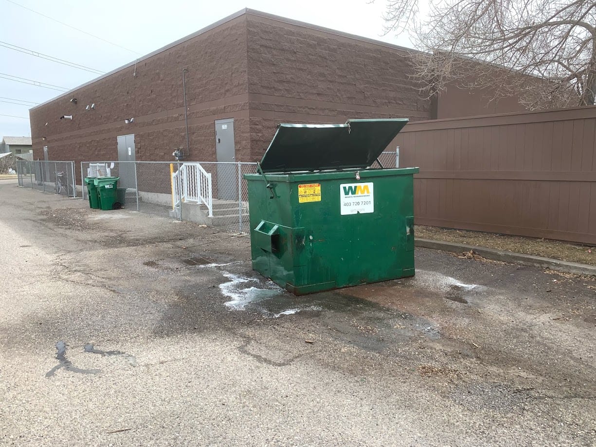 Graffiti gone from Green dumpster