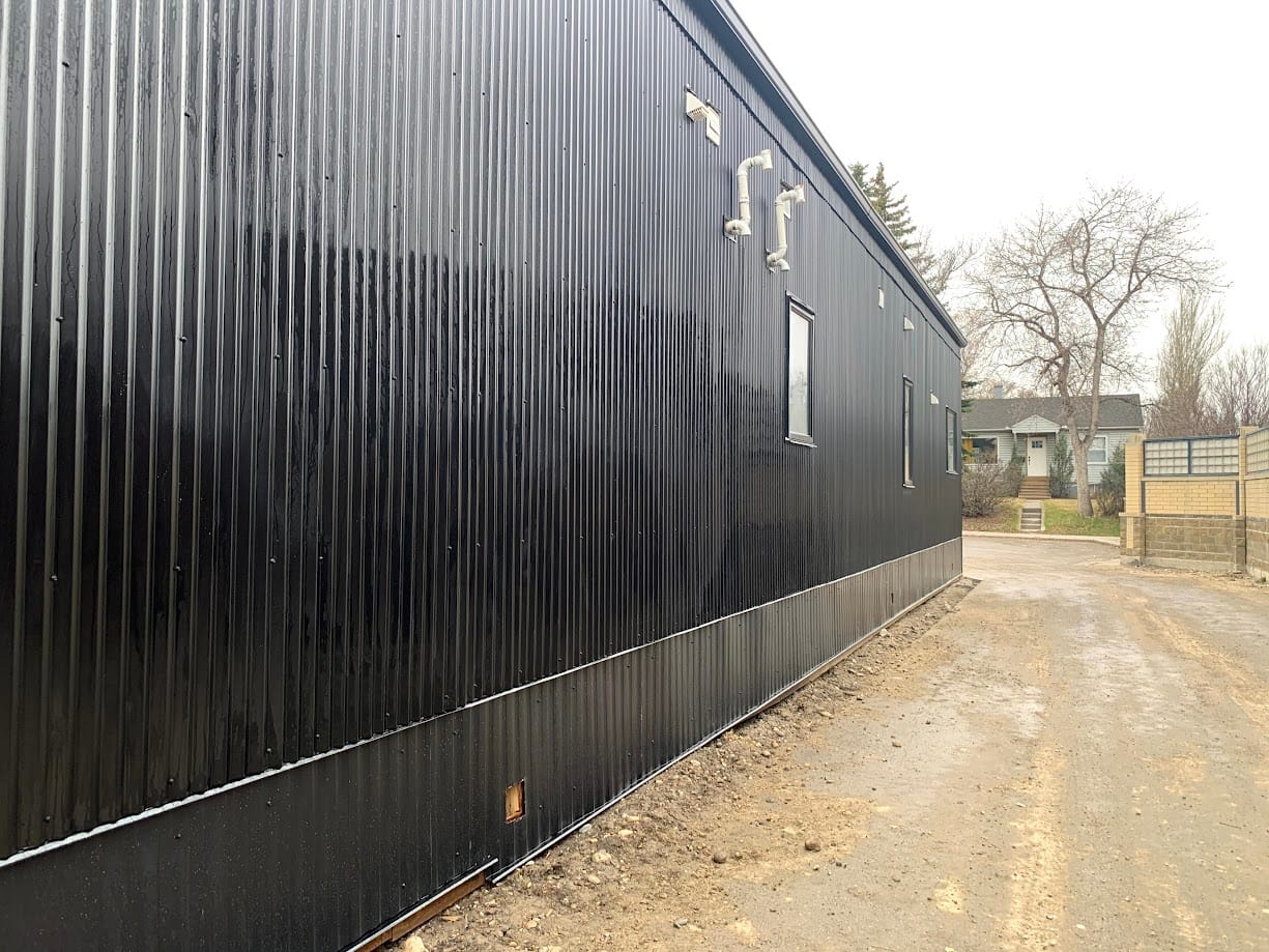 Pink Graffiti removed from Metal Siding