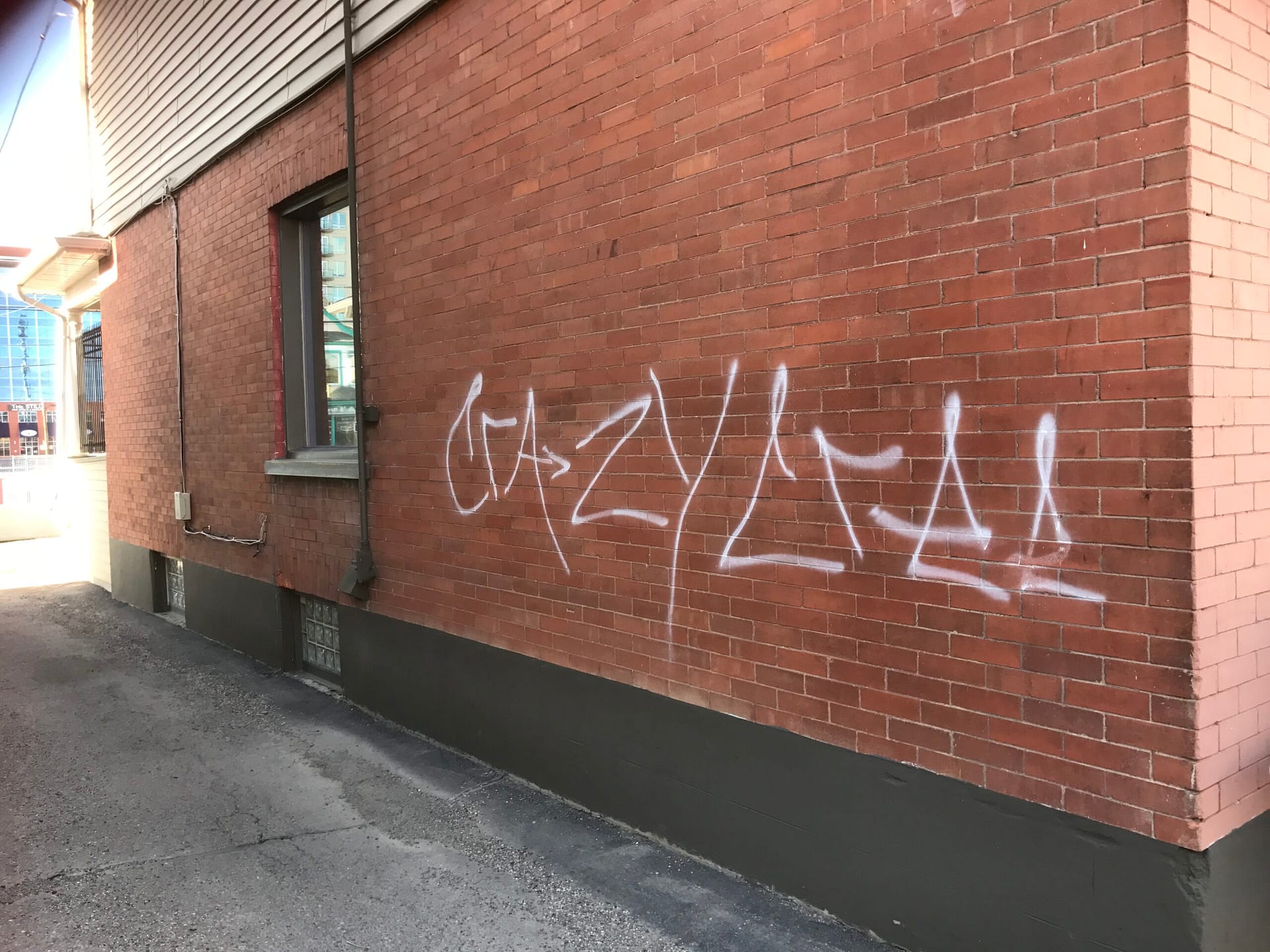 Brick wall graffiti removal