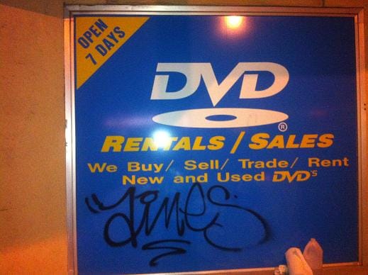 Vinyl Business sign graffiti removal