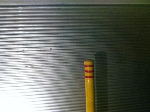 Graffiti removed from roll-up door Calgary