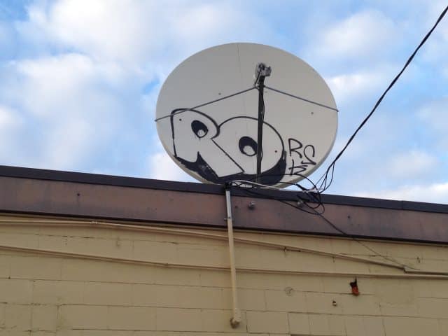 Sattelite Dish Graffiti Removal Calgary - before photo