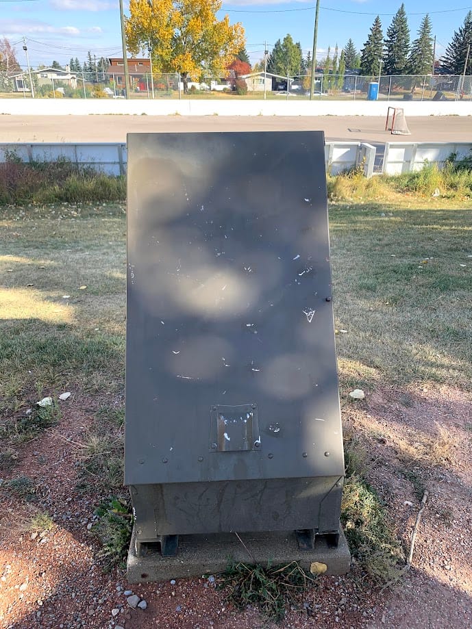 White paint on metal Garbage bin - removed