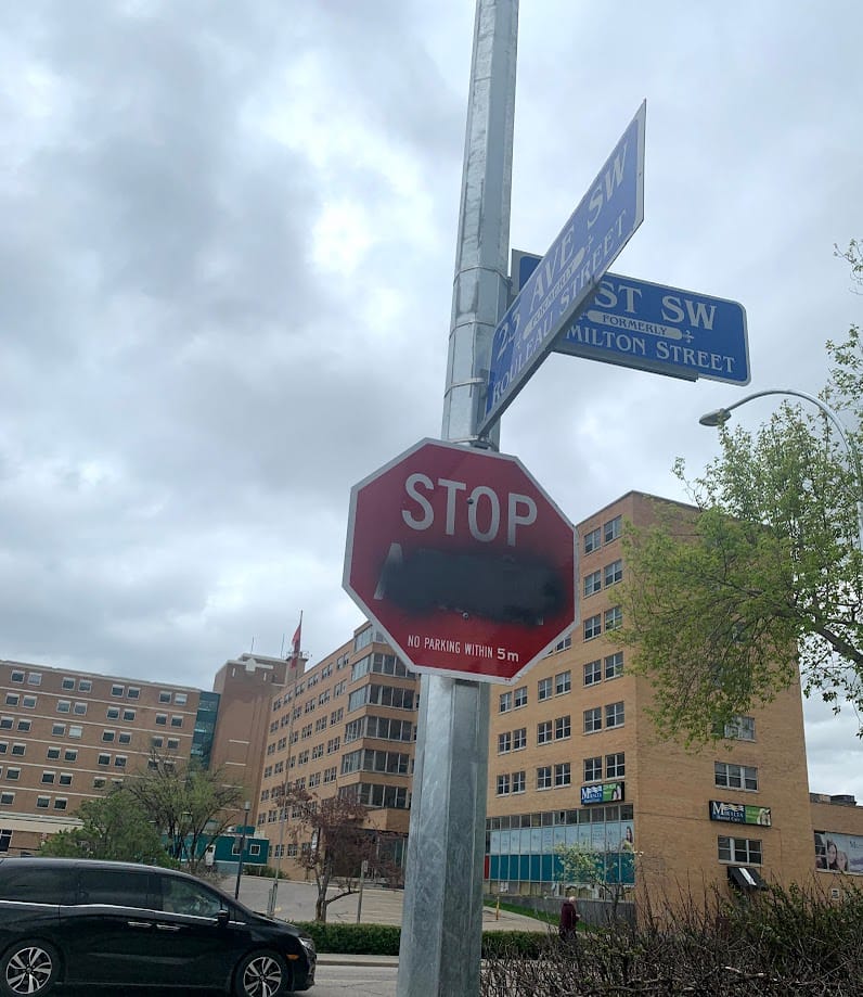 Black paint on 2nd Stop Sign