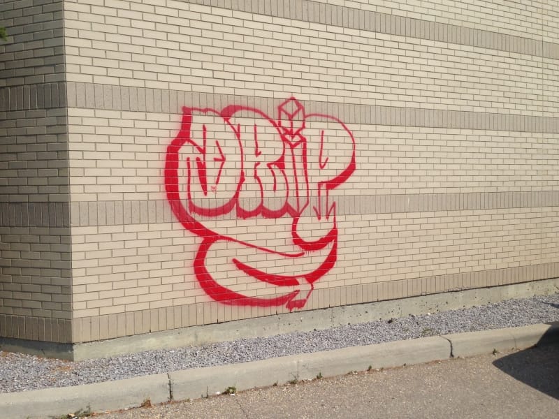 Brick wall graffiti removal - Calgary