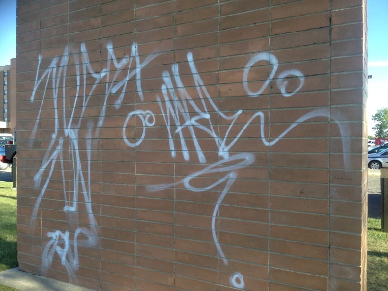 brick monument sign graffiti removal Calgary